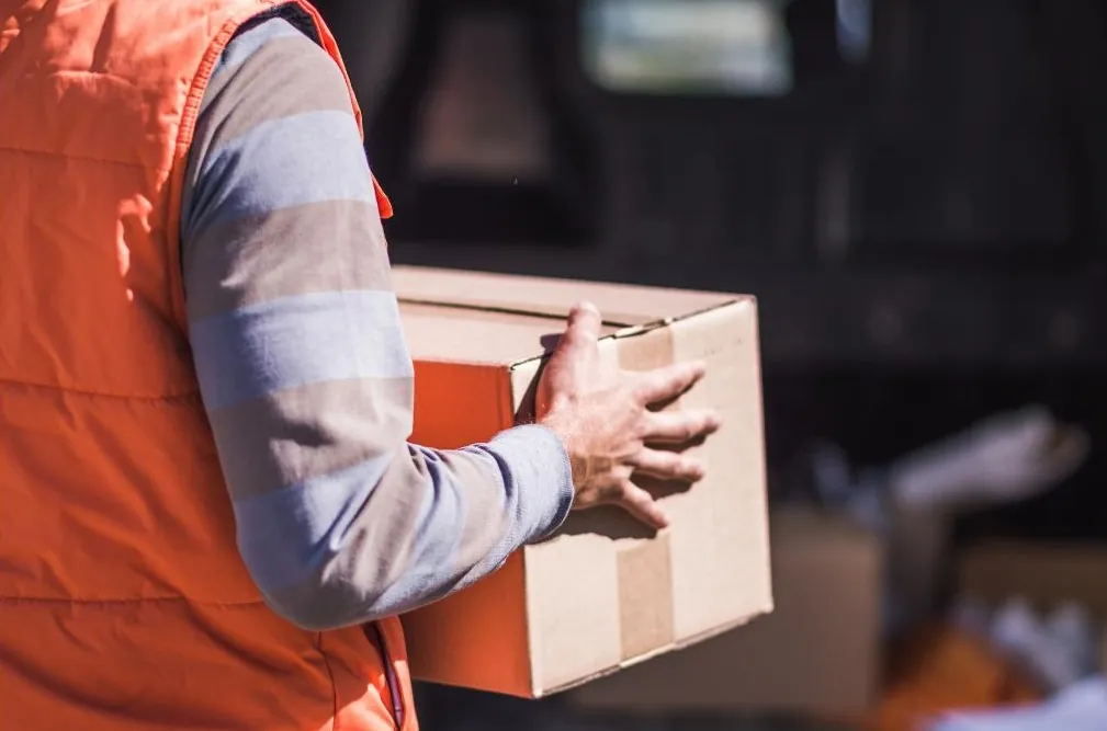 driver unloading a package