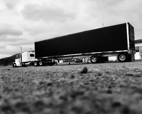 black and white photo of a truck 