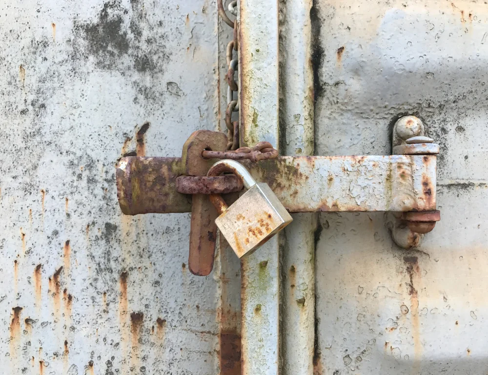 Cargo-theft-locked-container-rusty