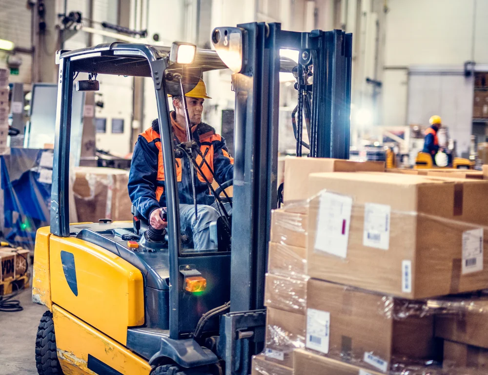 Cross-dock-and-warehousing-forklift-carrying-load