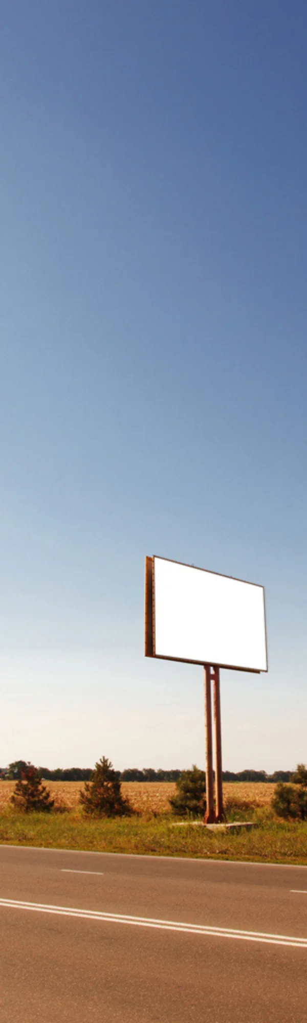 blank billboard sign above a highway