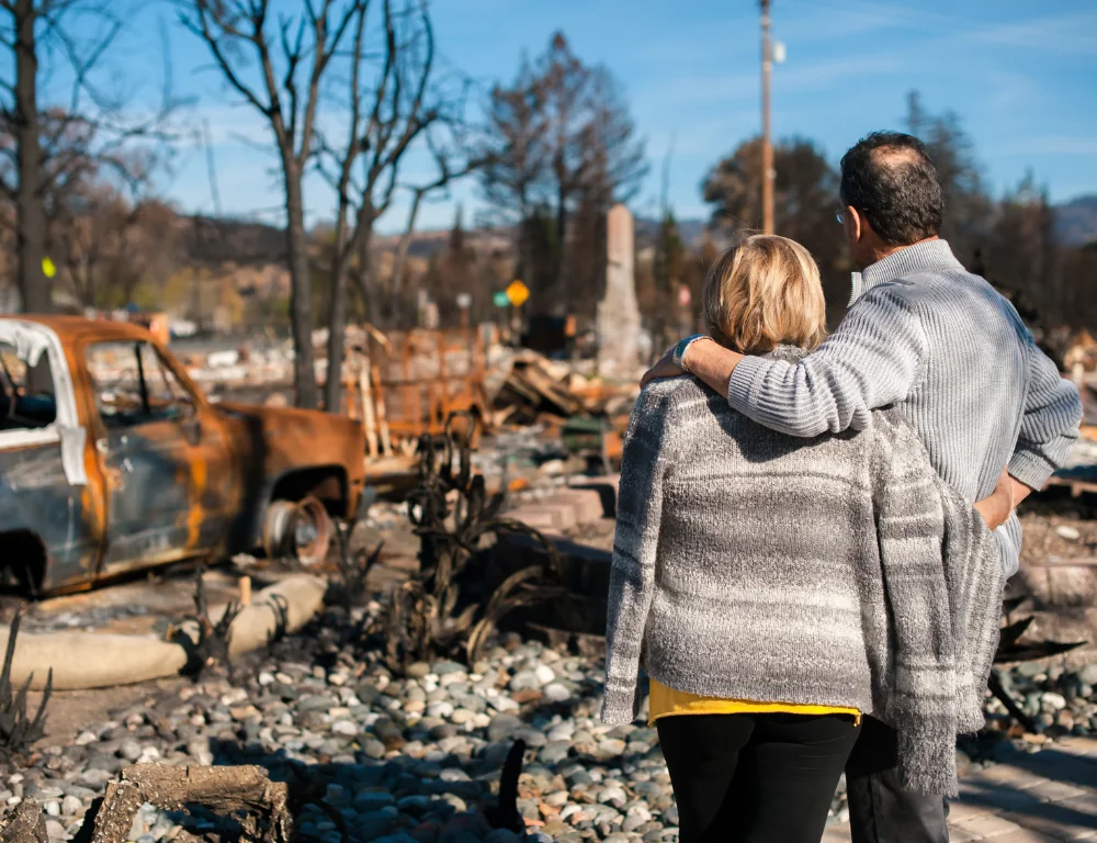 disaster-relief-items-couple-overlooking-disaster