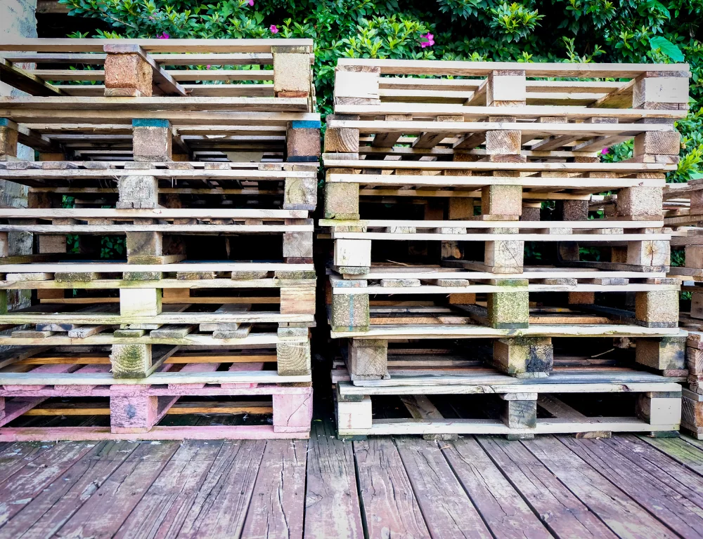 Where-To-Get-Free-Pallets-Stack-Of-Pallets-In-Front-Of-Garden