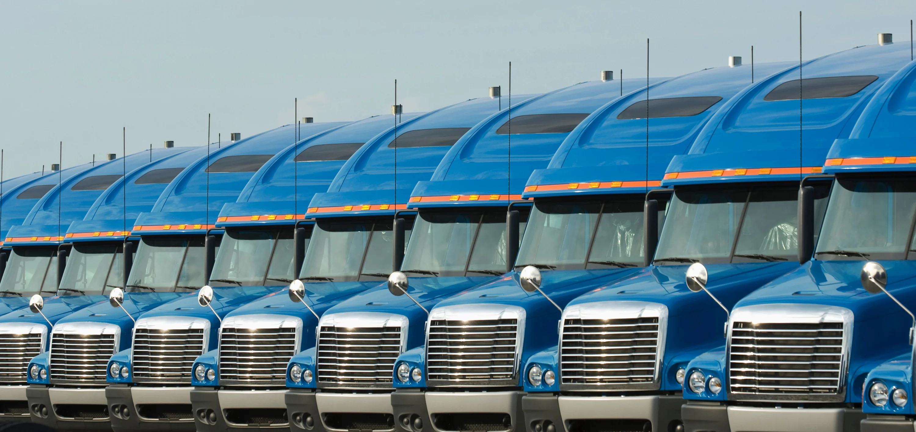 load-board-row-of-semi-trucks-heading-pic