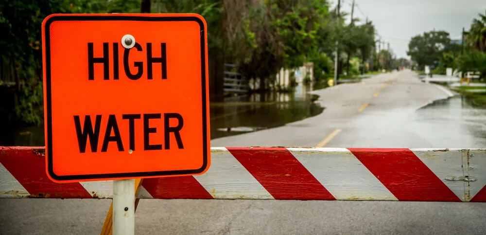 Bright orange high water sign