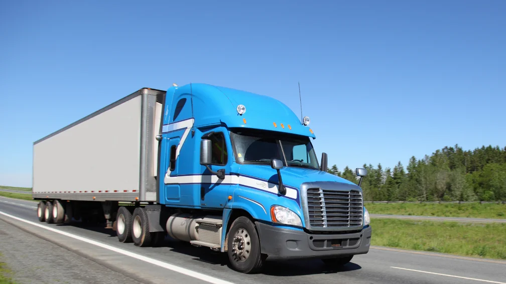 Cheapest Freight Quote-blue-semi-trailer-on-open-road