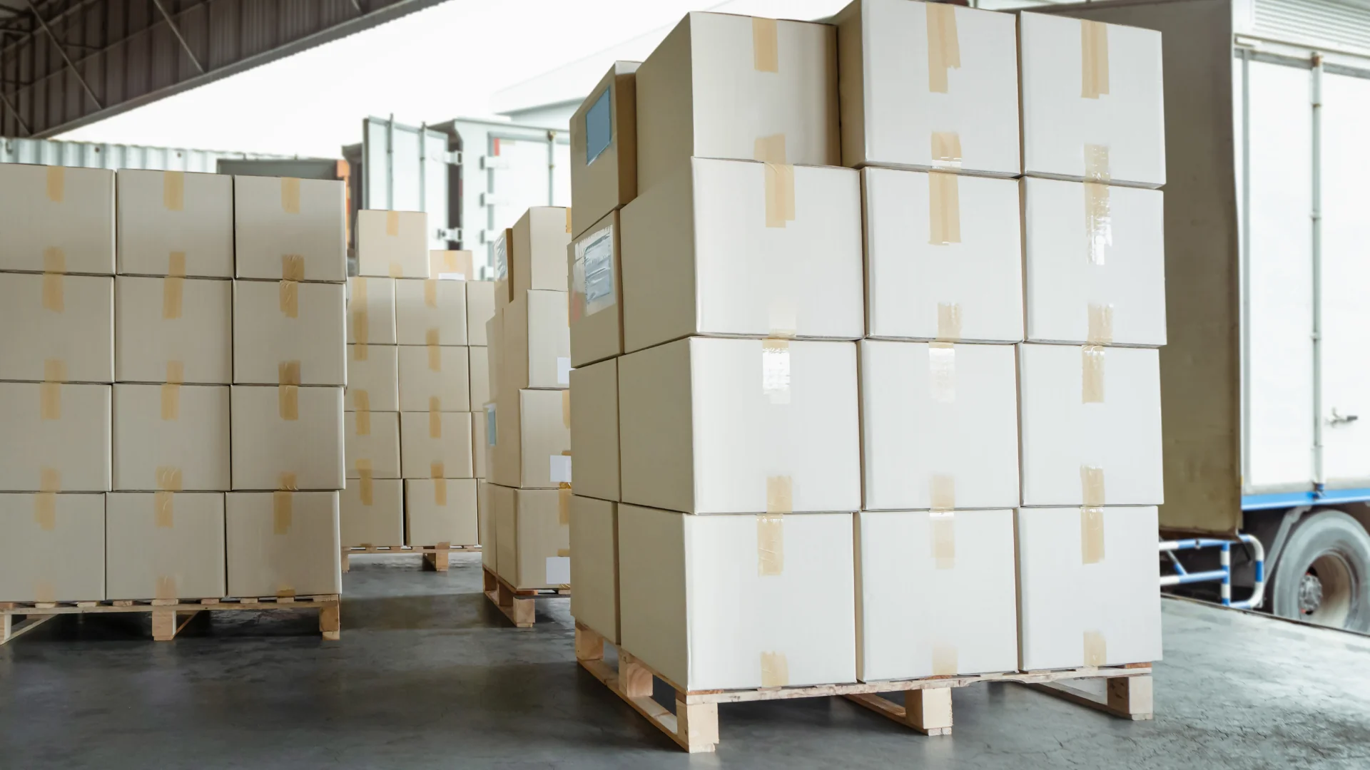 Freight Shipping Costs Surge boxes on pallets ready to load