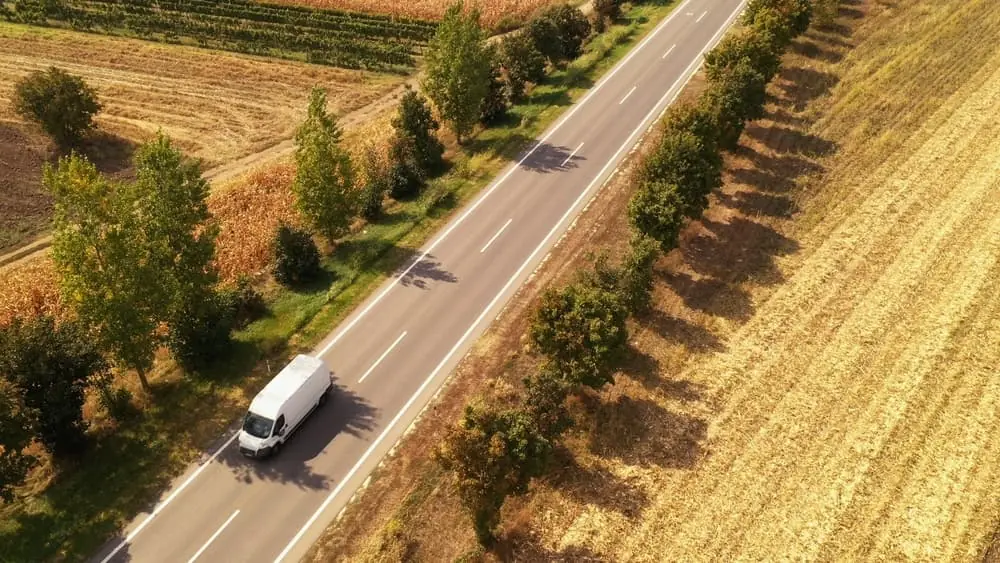 hot shot truck travelling down highway