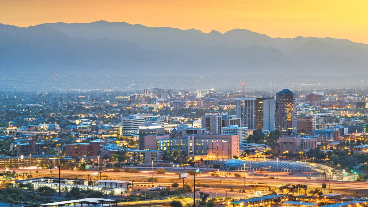 Tucson Freight Shipping Tucson cityscape at night overlooking city and highway