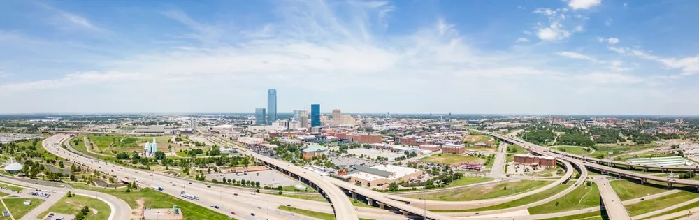 Oklahoma City Freight Shipping aerial view of Oklahoma City's highways connecting into the city at daytime