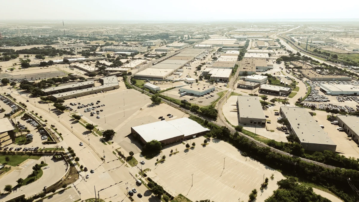 Arlington Freight Shipping aerial view of warehouses with freight railroad in background