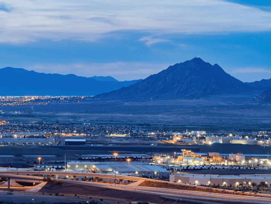 Henderson Freight Shipping aerial view of Henderson at night with mountains as background