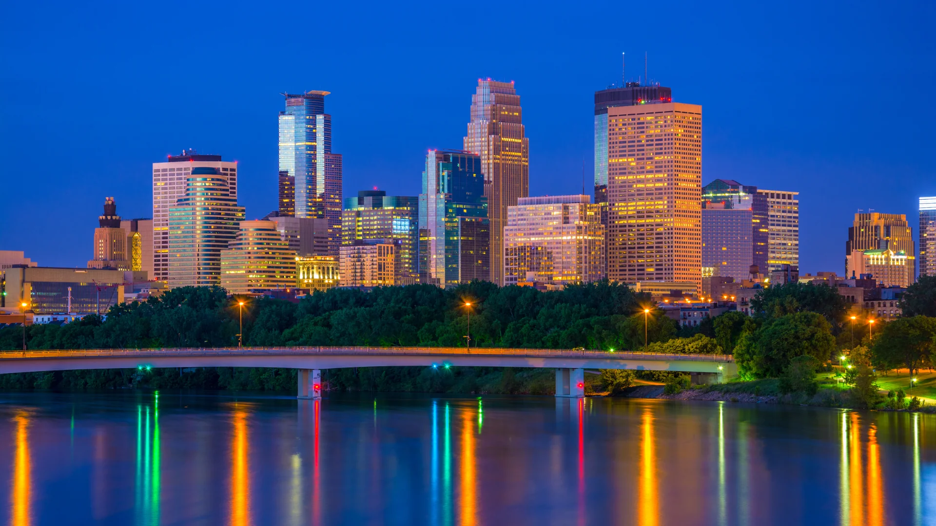 Minneapolis Freight Shipping cityscape of Minneapolis at night overlooking bridge