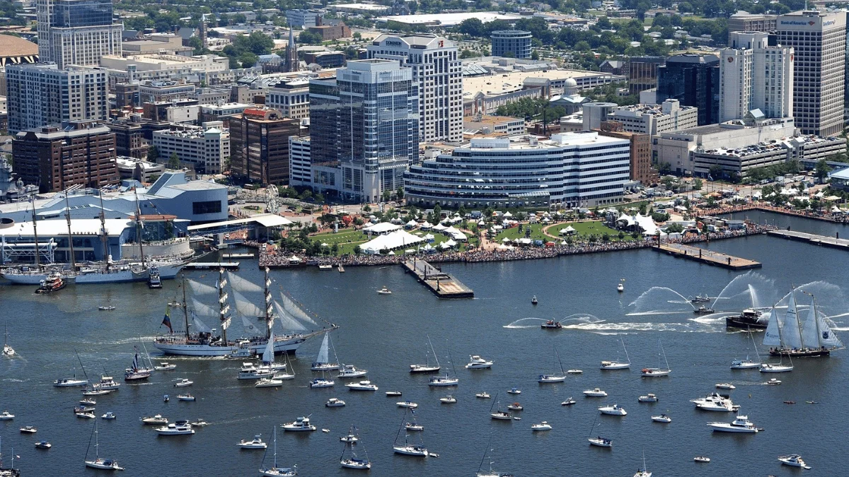 Norfolk Freight Shipping aerial view of boat festival with Norfolk cityscape in the background at daytime