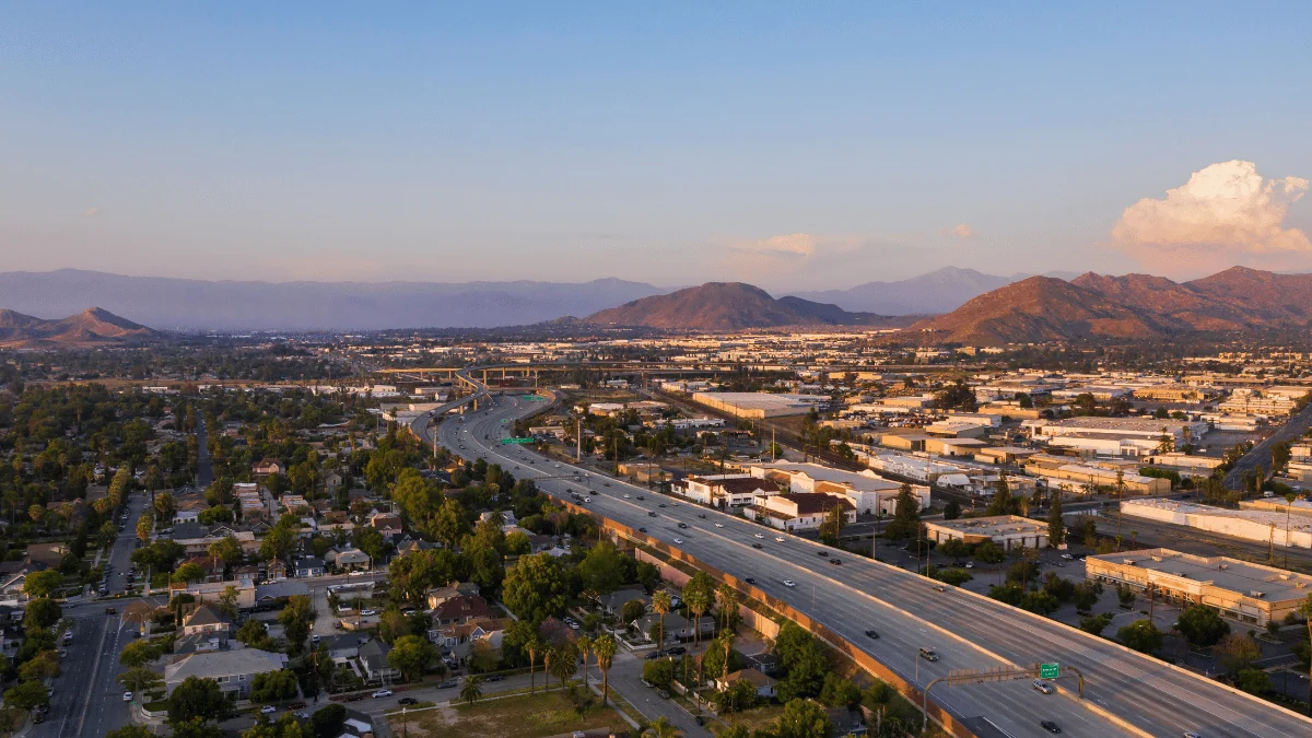 Riverside Freight Shipping aerial view of major highway cutting through Riverside