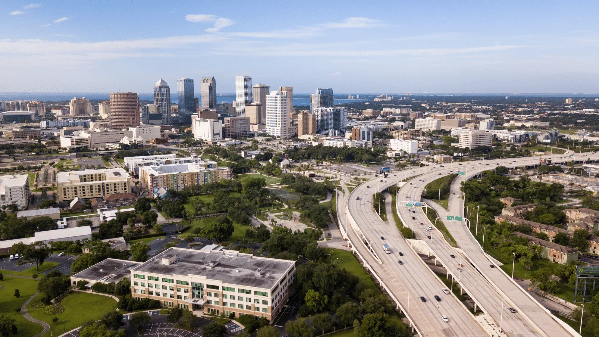 Tampa Freight Shipping aerial view of Tampa with highway at foreground