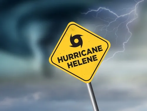 Hurricane Helene written on yellow caution road sign