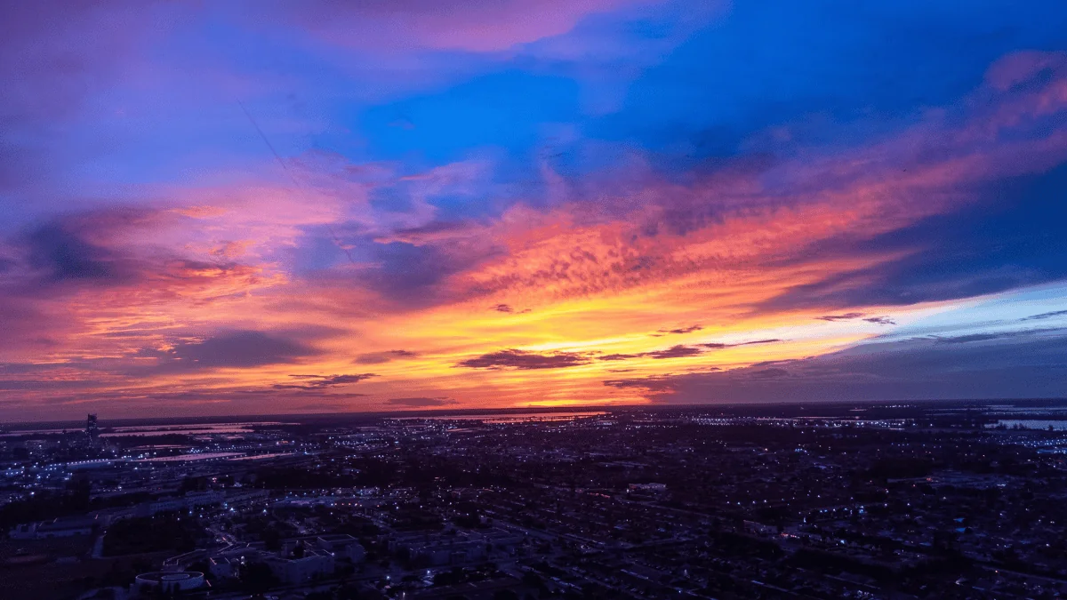 Hialeah Freight Shipping aerial view of Hialeah and Hialeah Gardens city at sunset