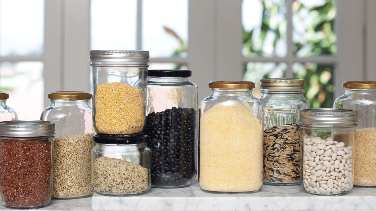 Shipping Dry Goods dried foods in glass jars on kitchen top counter