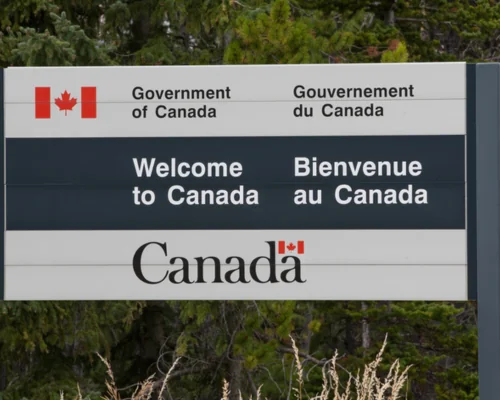 USA & Canada Border Post Sign 