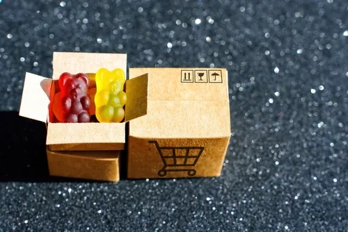 miniature sized box with gummies inside