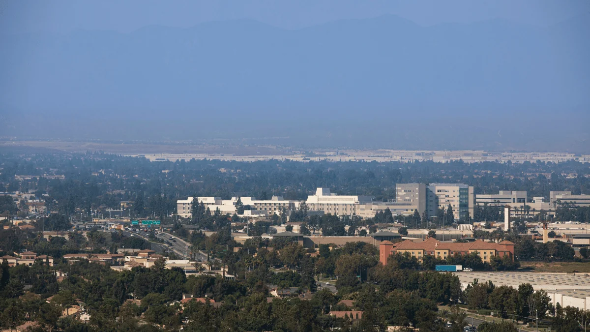 Fontana Freight Shipping aerial view of downtown district of Fontana with highway out of the city to the left