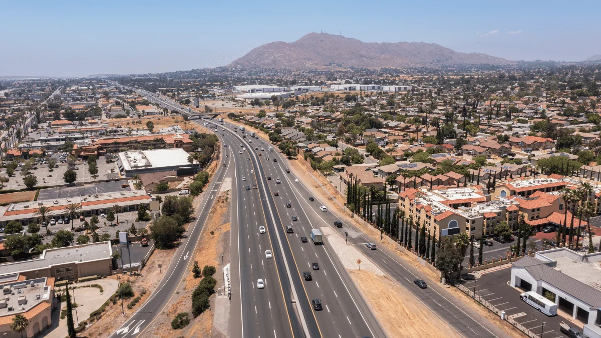 Moreno Valley Freight Shipping aerial view of highway intersecting through downtown Moreno Valley during the day