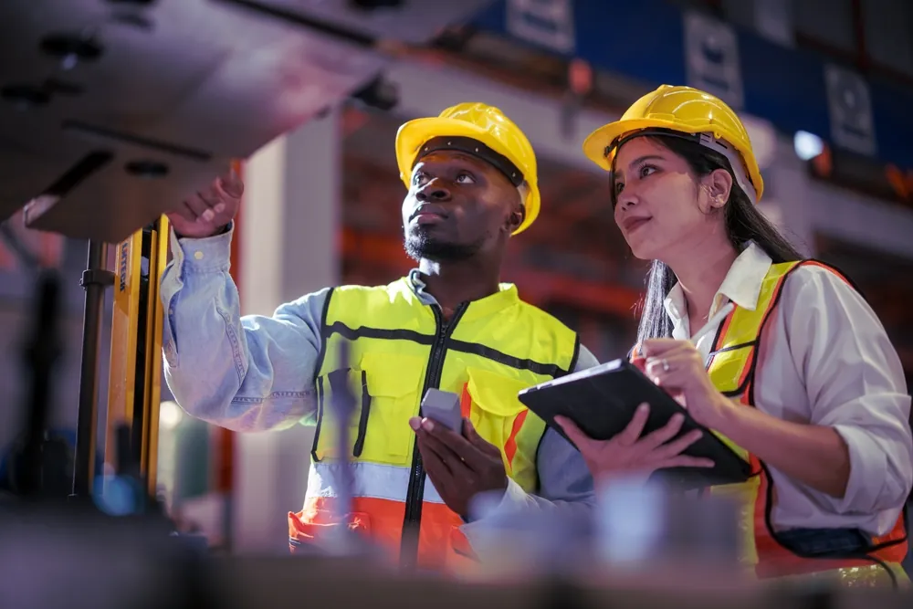 workers in automated warehouse