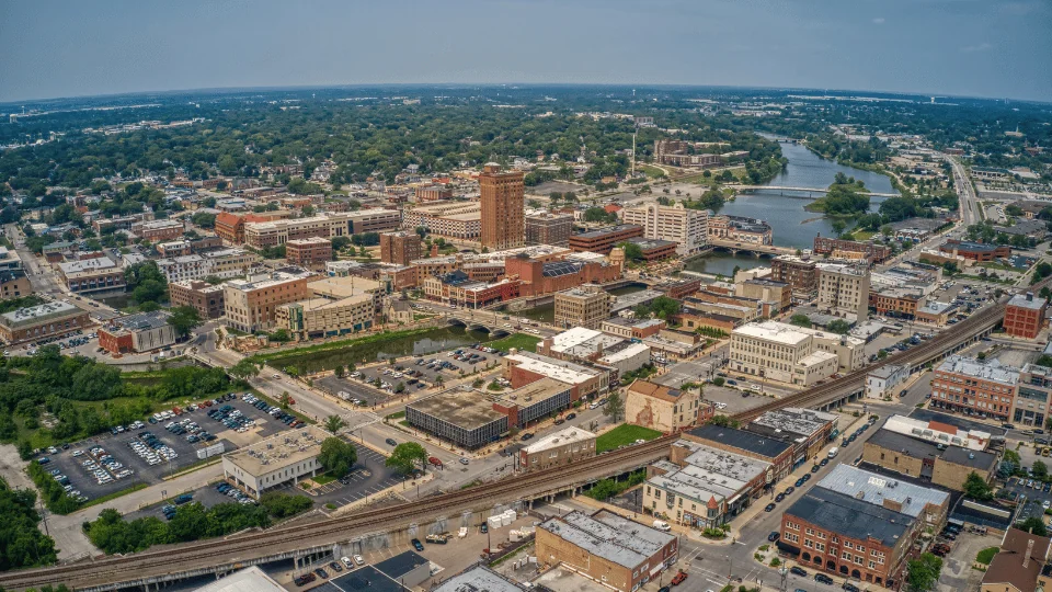 Aurora Illinois Freight Shipping aerial view of downtown Aurora including railroad track during summer