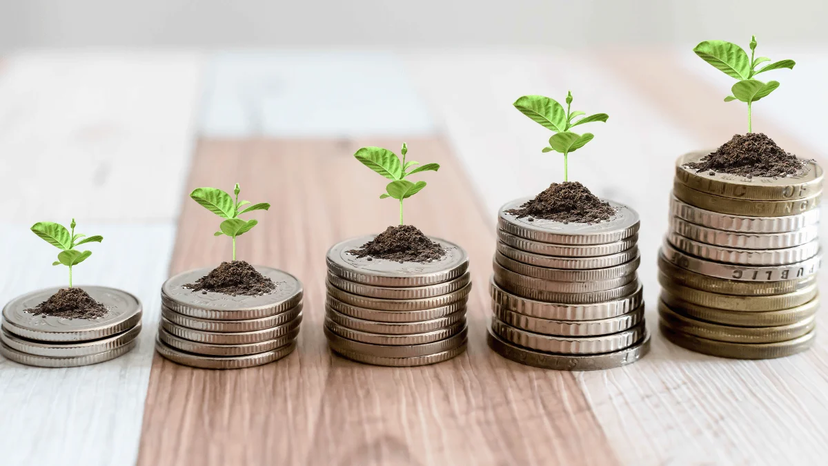 Scalable Supply Chain Solutions piles of coins increasing from left to right with tiny tree sprouts growing out of each pile