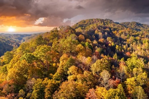 Soaring over the wooded Appalachian Mountains at sunset.