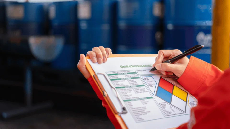 Shipping Chemicals and Hazardous Materials safety officer checking off Chemical Hazardous Material checklist