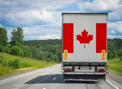 Semi truck with the Canadian flag on the back