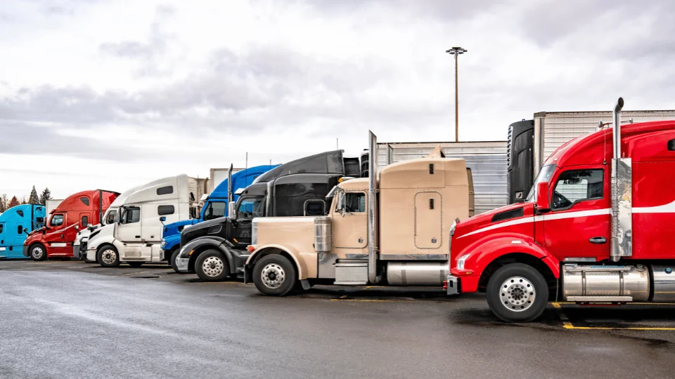 How to Diversify Your Supply Chain line up of different colored semi trucks parked in parking lot