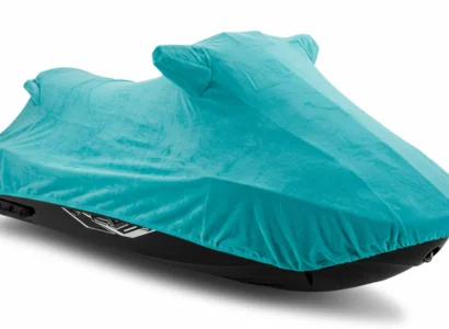 teal soft cover on a jet ski