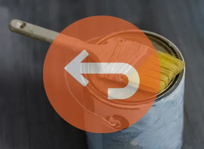 return arrow vector icon in front of a paint can