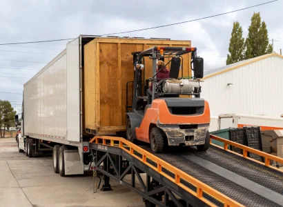 forklift loading a semi trailer